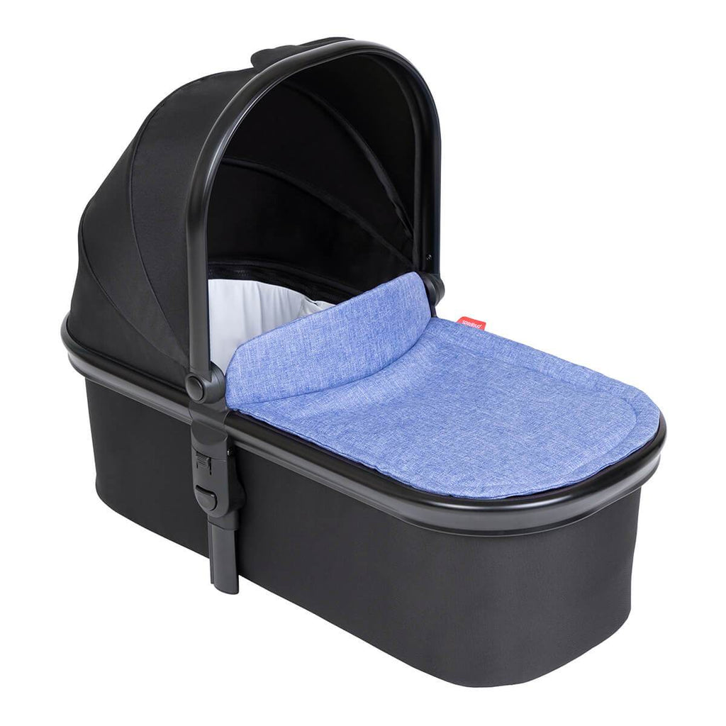 keep your newborn high & close with snug™ carrycot