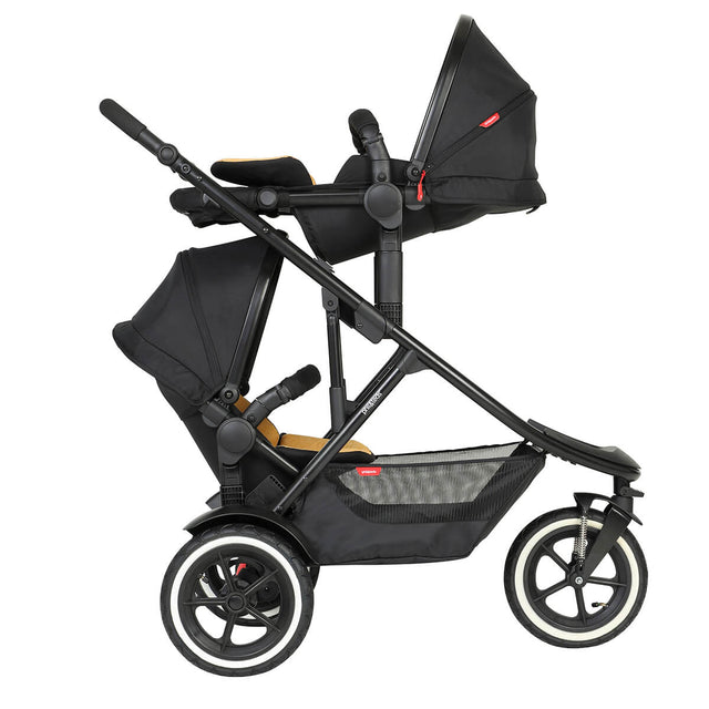 phil&teds sport verso inline buggy in double or twin - rear facing lie flat newborn mode with front facing double kit toddler rear seat using - open sun hoods - 3/4 view_butterscotch