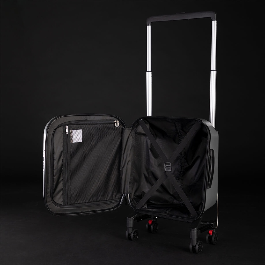 Mountain Buggy skyrider luxury shown open to highlight spacious internal storage with luggue stays and dual zipped pockets_silver